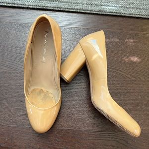 Neutral skin tone via spiga patent nude heels